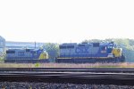 CSX 6001 rolls past CSX # 8781 near the Emerson Shops